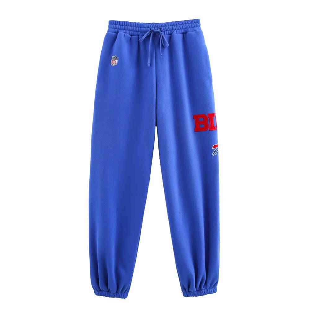 

Весна 2025 Женский пуловер с цветными блоками и надписью и комплект длинных брюк Small темно-синий