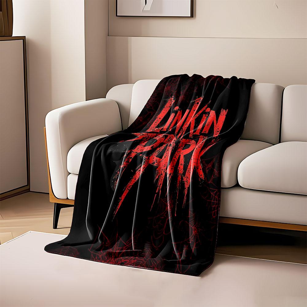 

Red distressed text with spiderweb patterns on a black background. for all seasons blanket lunch break throw gift 80cm x 120cm