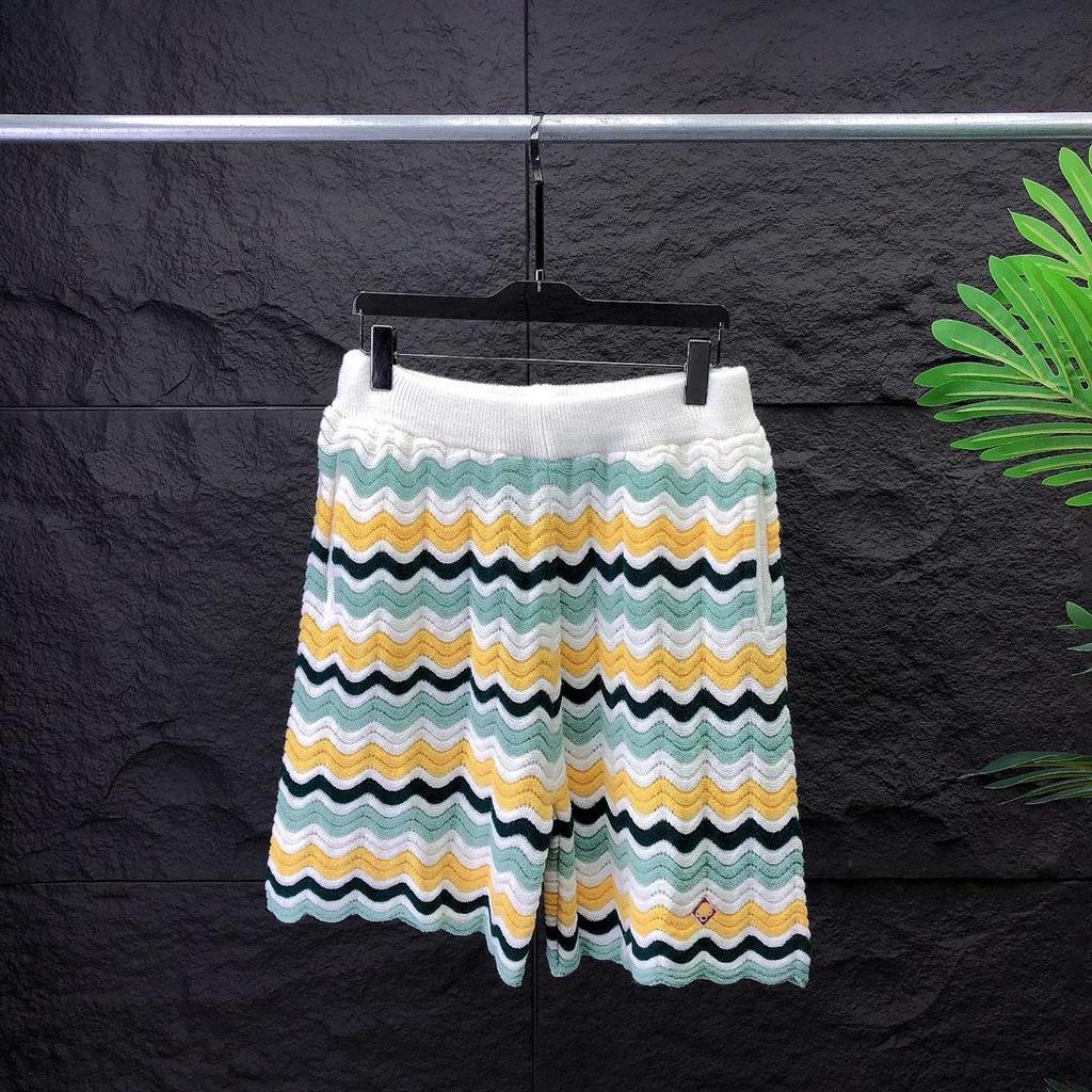 Women's Casual Knitted Wool Suit: Short-Sleeved Sweater & Shorts with Pearl Buttons and Color Matching.