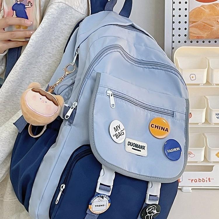 Schoolbag female ins Korean version girl versatile schoolbag lightweight solid color large capacity junior high school student computer backpack
