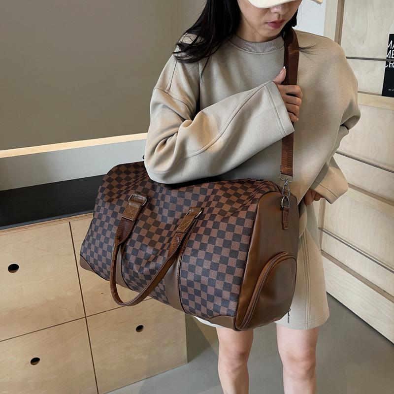 Borsone PU a quadri borsa da viaggio di alta gamma portatile impermeabile leggera grande capacità borsa da cabina