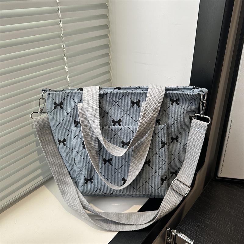 Sommer neue einfache und modische tragbare Tragetasche beliebte Mode Retro Pendler Schulter Umhängetasche