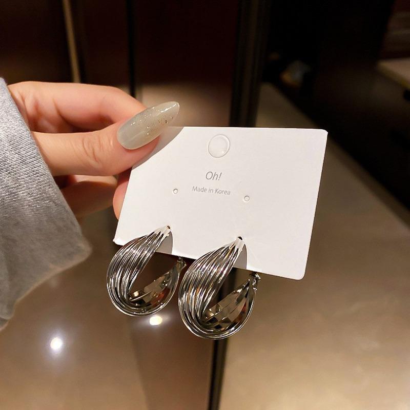 Silver plain ring earrings women's light luxury high-end stud earrings 2026 new popular niche exaggerated temperament earrings earrings