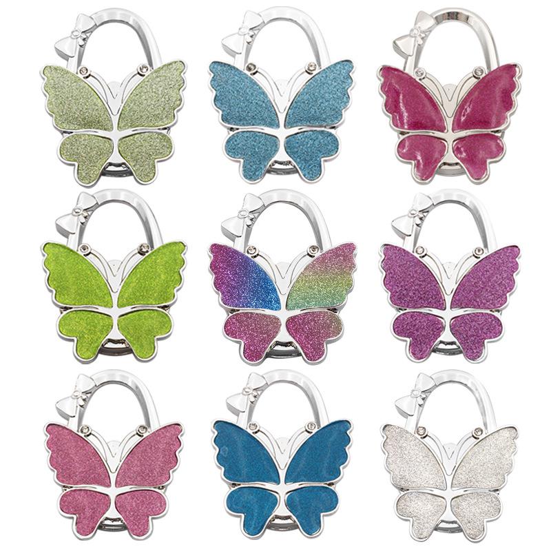 Large Matte Butterfly Hanging Bag Hook - Foldable Women's Bag Buckle & Portable Table Edge Hook for Luggage Accessories.