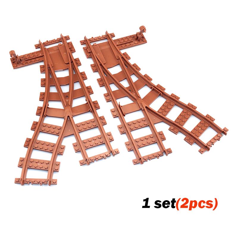 

Нетоксичные новые городские поезда Гибкие рельсы Мягкие прямые изогнутые рельсы Смена пути Коричневый переключатель Строительные блоки Железные дороги Модели Игрушки Для детей