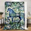 A blue horse entwined with vines and surrounded by blue peonies. for all seasons blanket lunch break throw gift