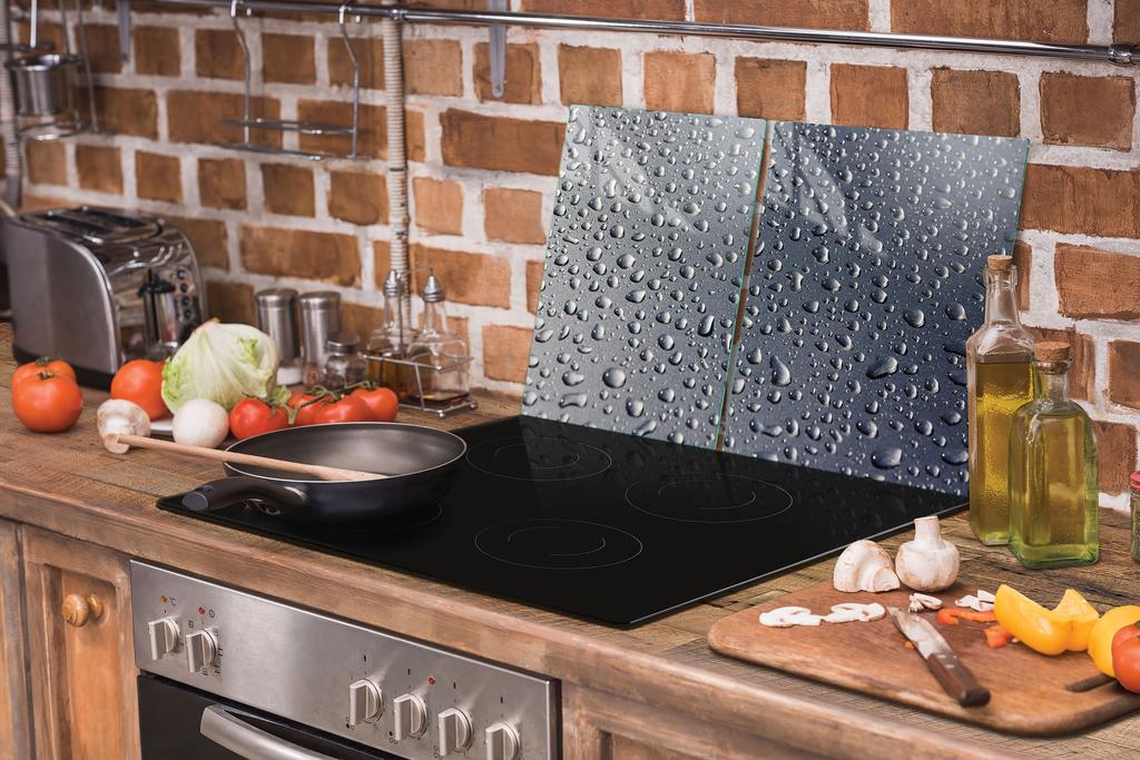 GLAS-KOCHFELDSCHUTZPLATTE 90x52 TROPFEN