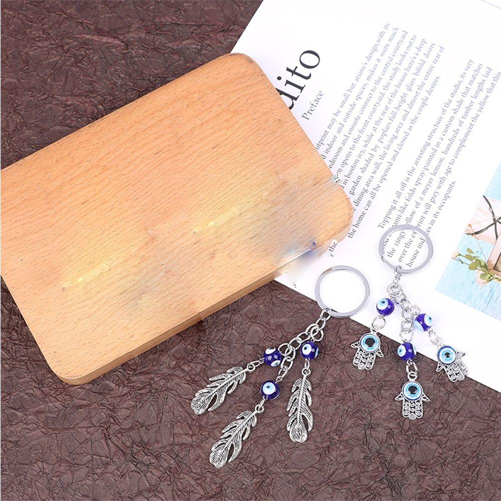 

Подарок девушке милый цинковый сплав цинковый сплав ниша дизайн автомобильный брелок демон глаз брелок сумка аксессуары рука Фатимы A