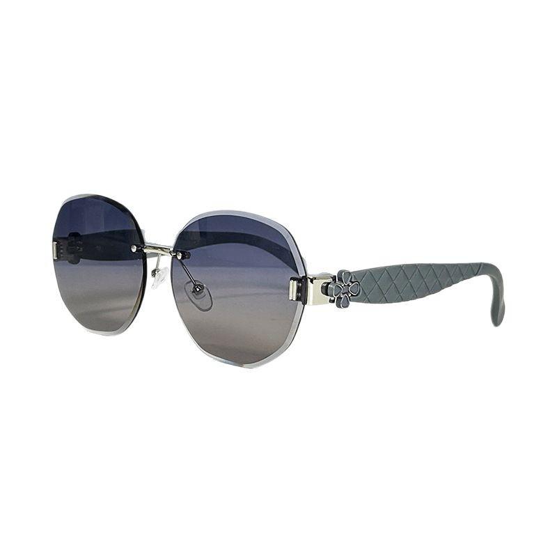 Women's Egg-Shaped Stylish Frameless Retro Sunglasses for Summer Photoshoots