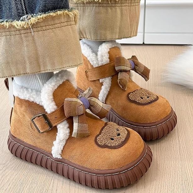 Niedliche, modische, vielseitige Cartoon-Schneestiefel für Damen im Winter 2025, neue Modelle für Damen, die warm gefütterte Baumwollschuhe mit dicker Sohle tragen