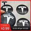 Наклейка на авто 4 шт. 56 мм Чорно-біла Ковпачок Tesla Ковпачок центральної маточини Наклейка з логотипом для Tesla Model 3 Y S X Персоналізована наклейка на авто C
