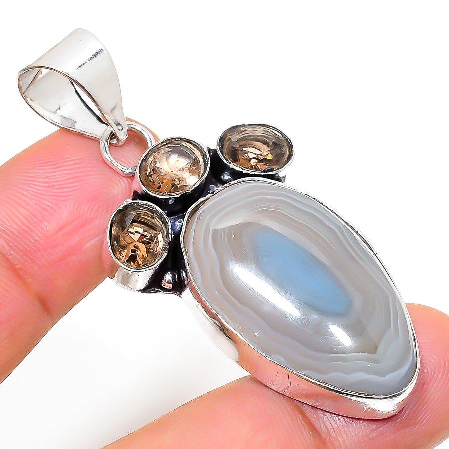 

Подвеска из натурального ботсванского агата и топаза из стерлингового серебра 925 пробы 2,17 дюйма E0g37