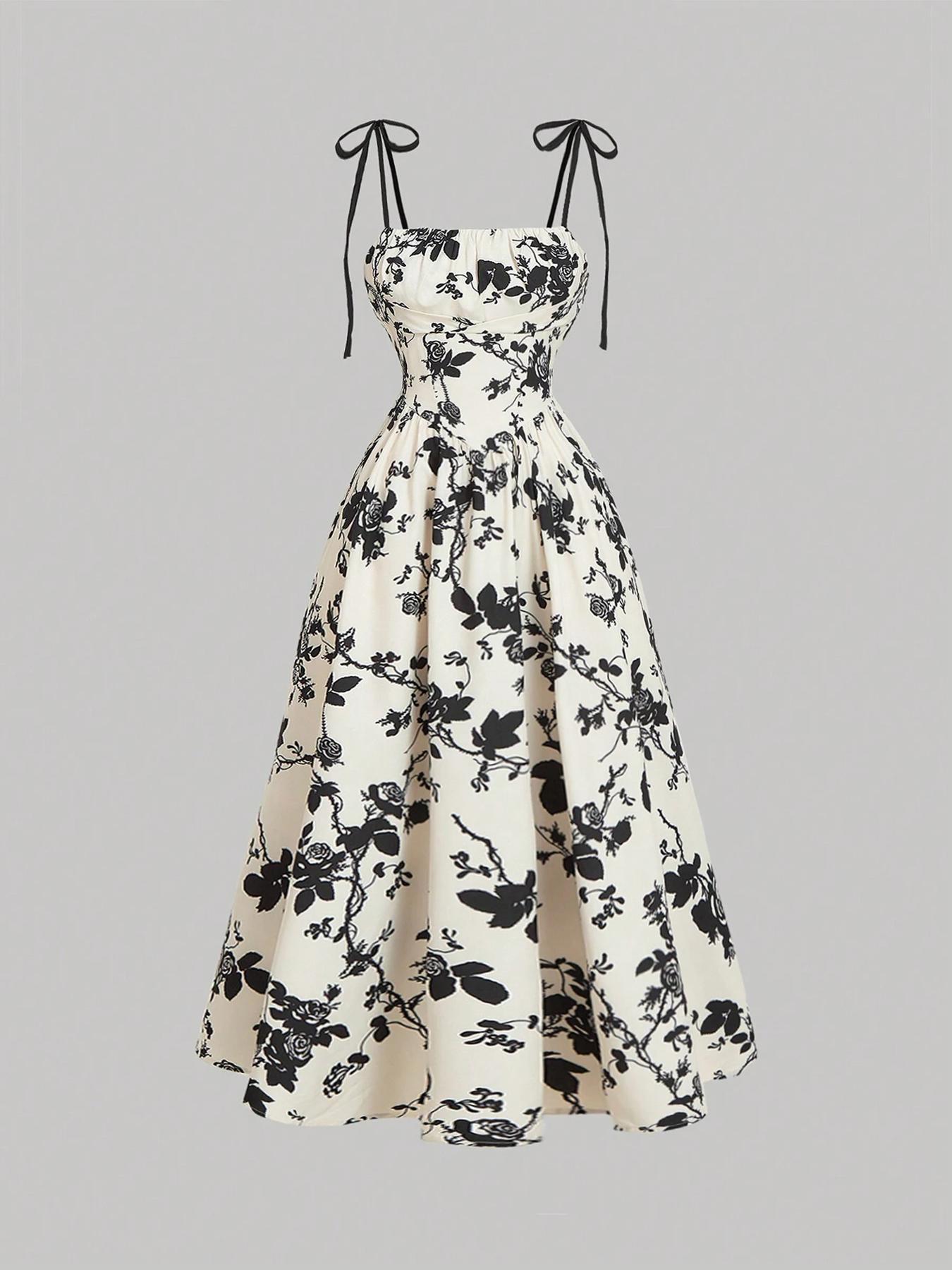 

Женское бежевое макси-платье без бретелей с цветочным принтом, деталью в виде банта и юбкой А-силуэта S белый