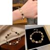 Sonnenthematischer Schmuck Handkette mit Imitationsperlen und funkelnden Strasssteinen für Damen