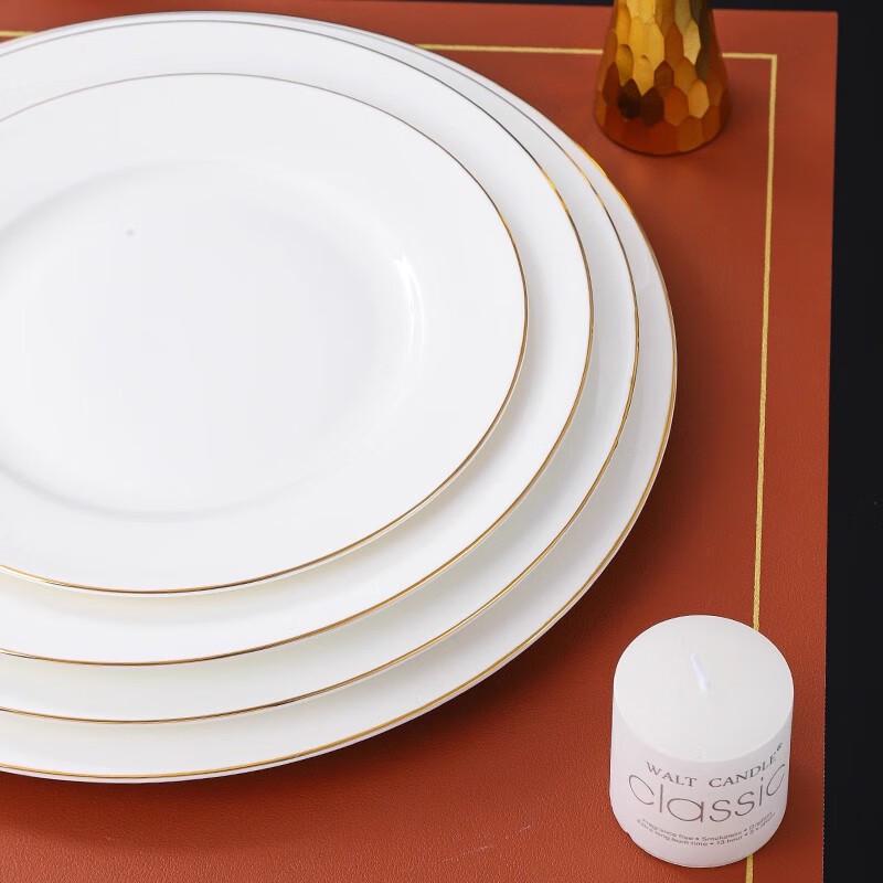 Elegant middagstallrik i keramik med guldkant