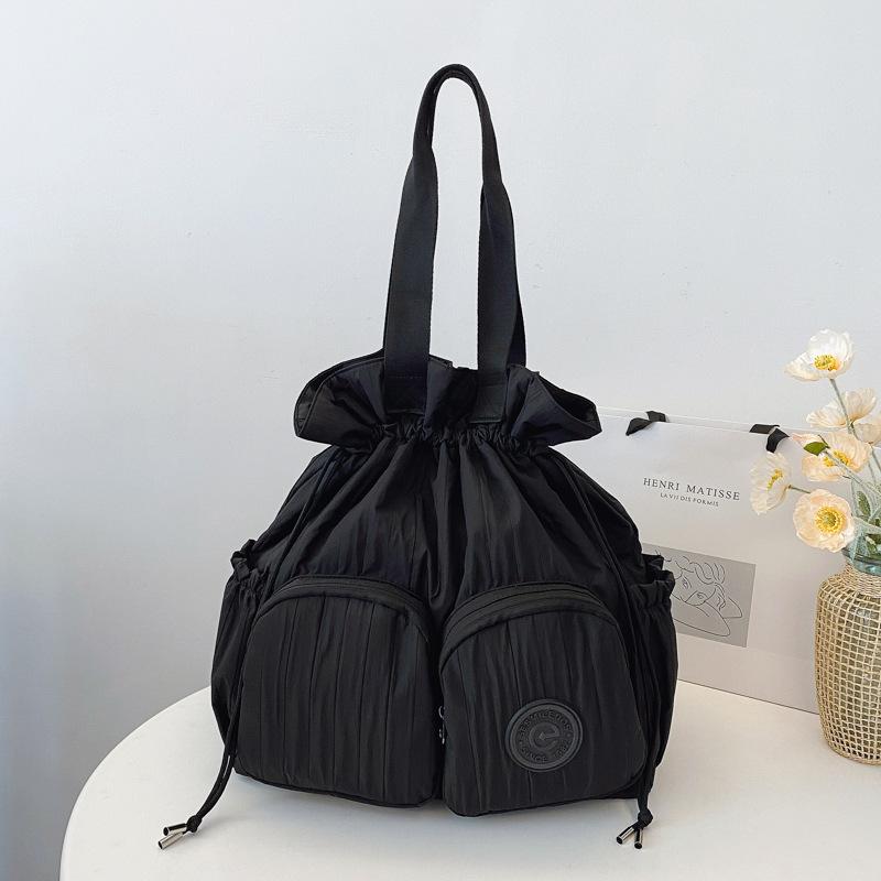 Academy style high value large capacity backpack women's new niche pleated drawstring shoulder bag
