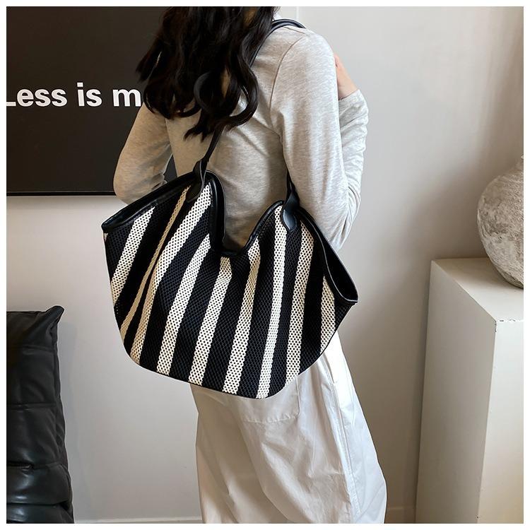 New largecapacity shoulder bag bag niche design knitted tote bag commuter versatile striped woven tote bag