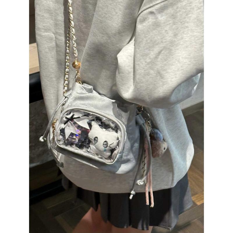

JIAERDI Drawstring Ripple Ita Bag Women Basic Anime Transparent Shoulder Bag Ladies Daily Casual Compact Bucket Crossbody Purse 20x15x11cm серебряный