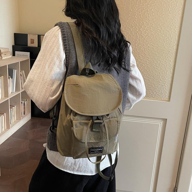 Schoolbag Korean version solid color simple backpack women's 1011 new commuter outdoor leisure versatile backpack light play bag