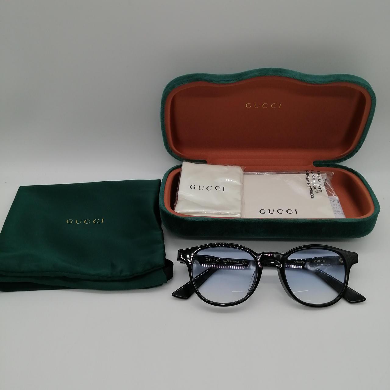 Used GUCCI GG0556OJ 001 glasses