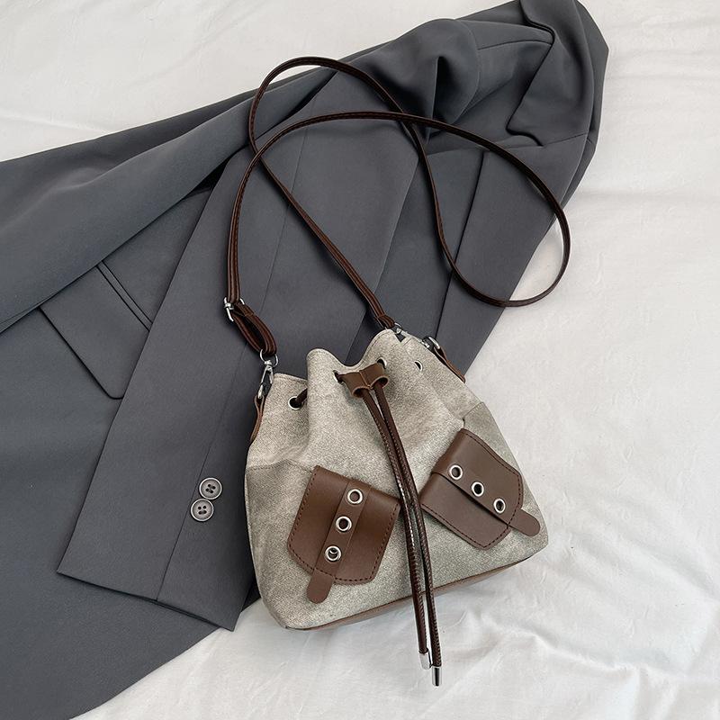 Personalized Simple Messenger Bucket Bag Women's 2025 Autumn New Korean Version Bow Fashion Drawstring Splicing Shoulder Bag