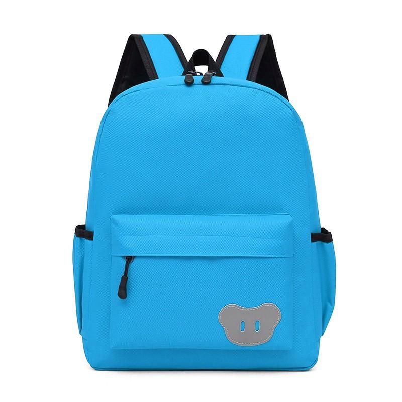 Solid color nylon primary school schoolbag school education polyester breathable burden reduction primary school