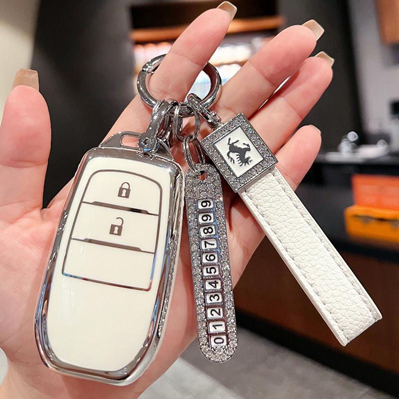 Applicable à la housse de clé Toyota Fenglanda Corolla Ruifang Lingfang 2023 Wesa Kuluze bz3 boucle de sac de voiture