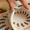 Handwoven Cotton Rope Placemat with Original Print Heat-Resistant Non-Slip Round Table Mat Decorative Kitchen Dining Accessory.