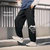 Li-Ning Sports Fashion Series American Retro Versatile Loose Mid-Waist Drawstring Letter Outdoor Running Fitness Casual Pants Men Pants AKLUC65-1