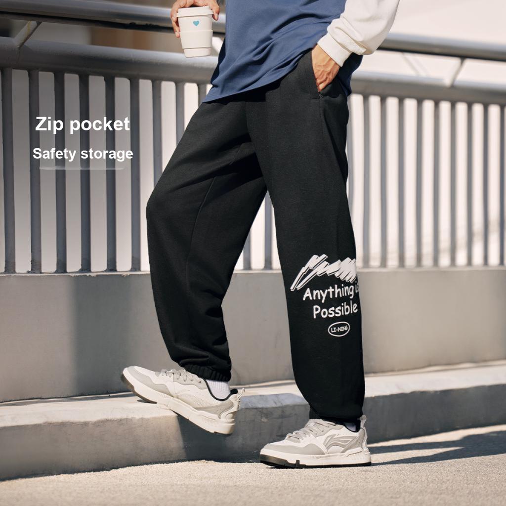 Li-Ning Sports Fashion Series American Retro Versatile Loose Mid-Waist Drawstring Letter Outdoor Running Fitness Casual Pants Men Pants AKLUC65-1
