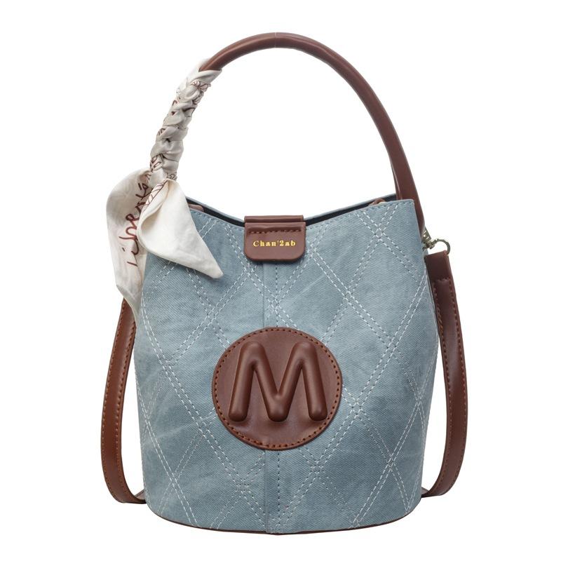 

Niche design popular commuter handbag bag women s summer 2025 new trendy high-end versatile messenger bucket bag синий