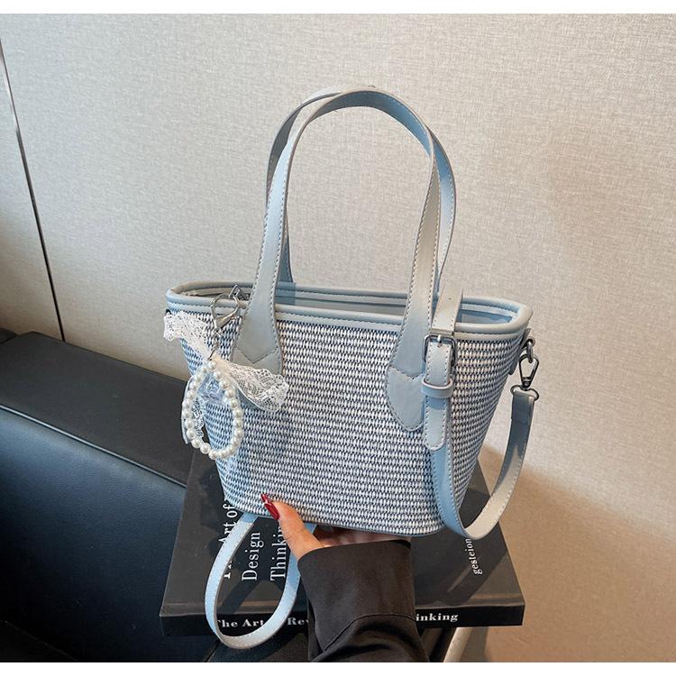 

Woven bag women s large-capacity new trendy seaside vacation shoulder bag hand bag crossbody straw bag синій