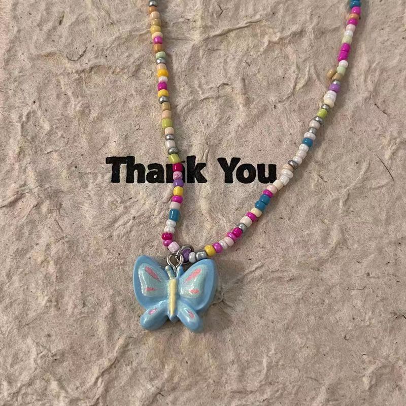 Simple color gradual change painted butterfly beaded necklace women's fashion temperament high sense sweet cool wind versatile collarbone chain
