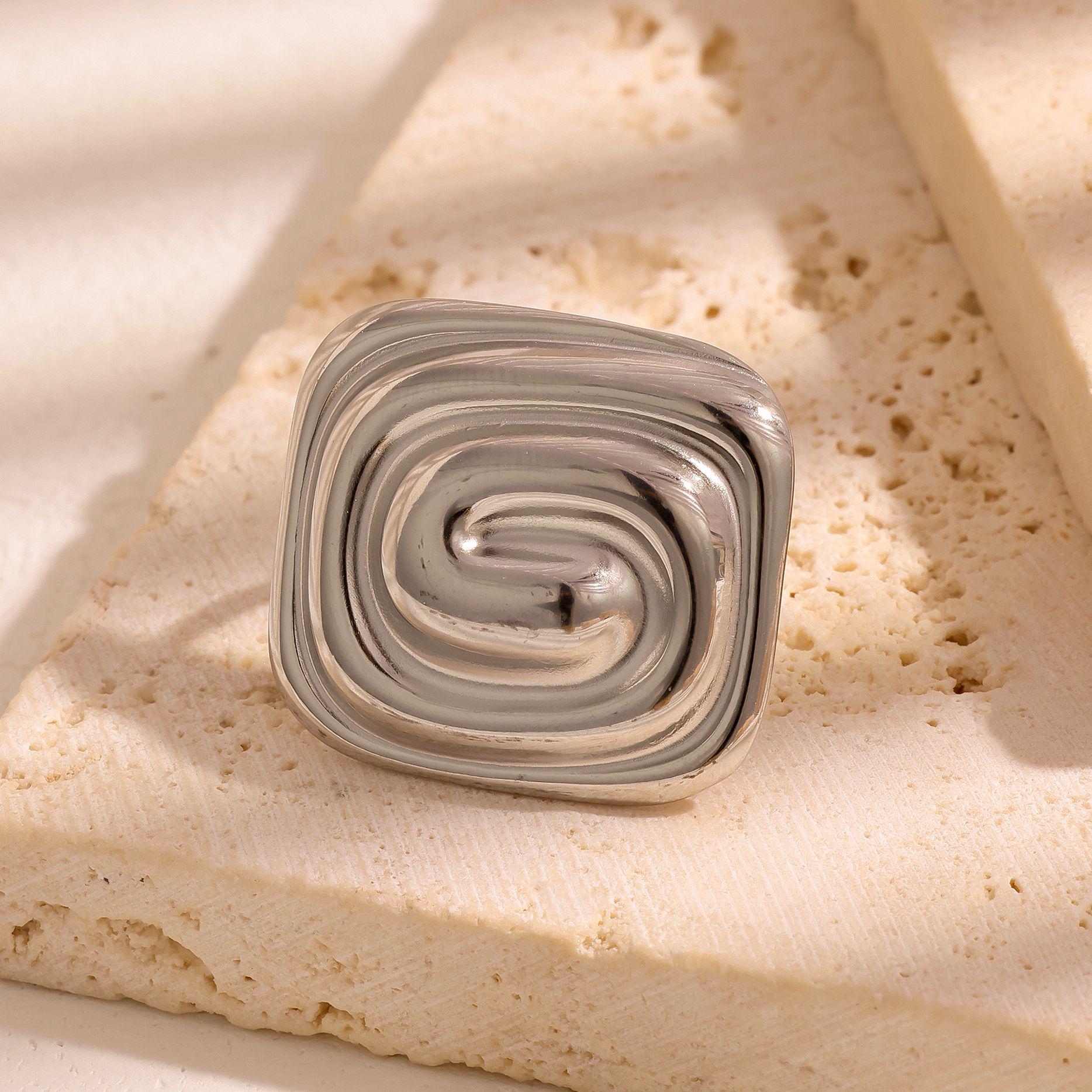 

18K Gold Stainless Steel Women s Ring - European & American Trendy Rectangular Spiral Vortex Pattern.