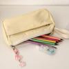 Nouvelle trousse à crayons Ins Grande capacité Mignon Sac à fournitures scolaires Simple pochette à crayons Portefeuille à monnaie pour étudiant Pochette à monnaie Sac de maquillage portable