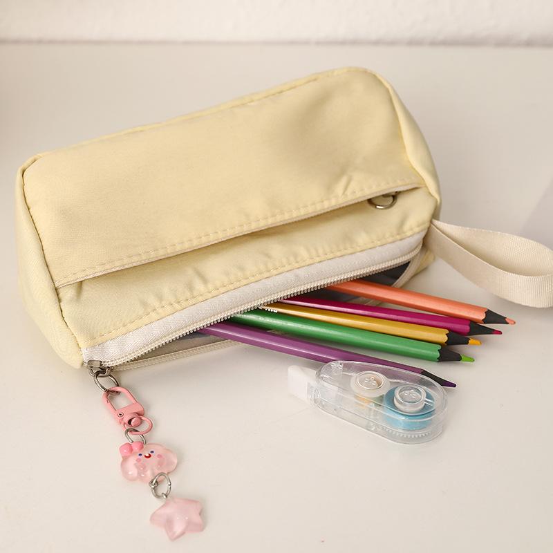 Nouvelle trousse à crayons Ins Grande capacité Mignon Sac à fournitures scolaires Simple pochette à crayons Portefeuille à monnaie pour étudiant Pochette à monnaie Sac de maquillage portable