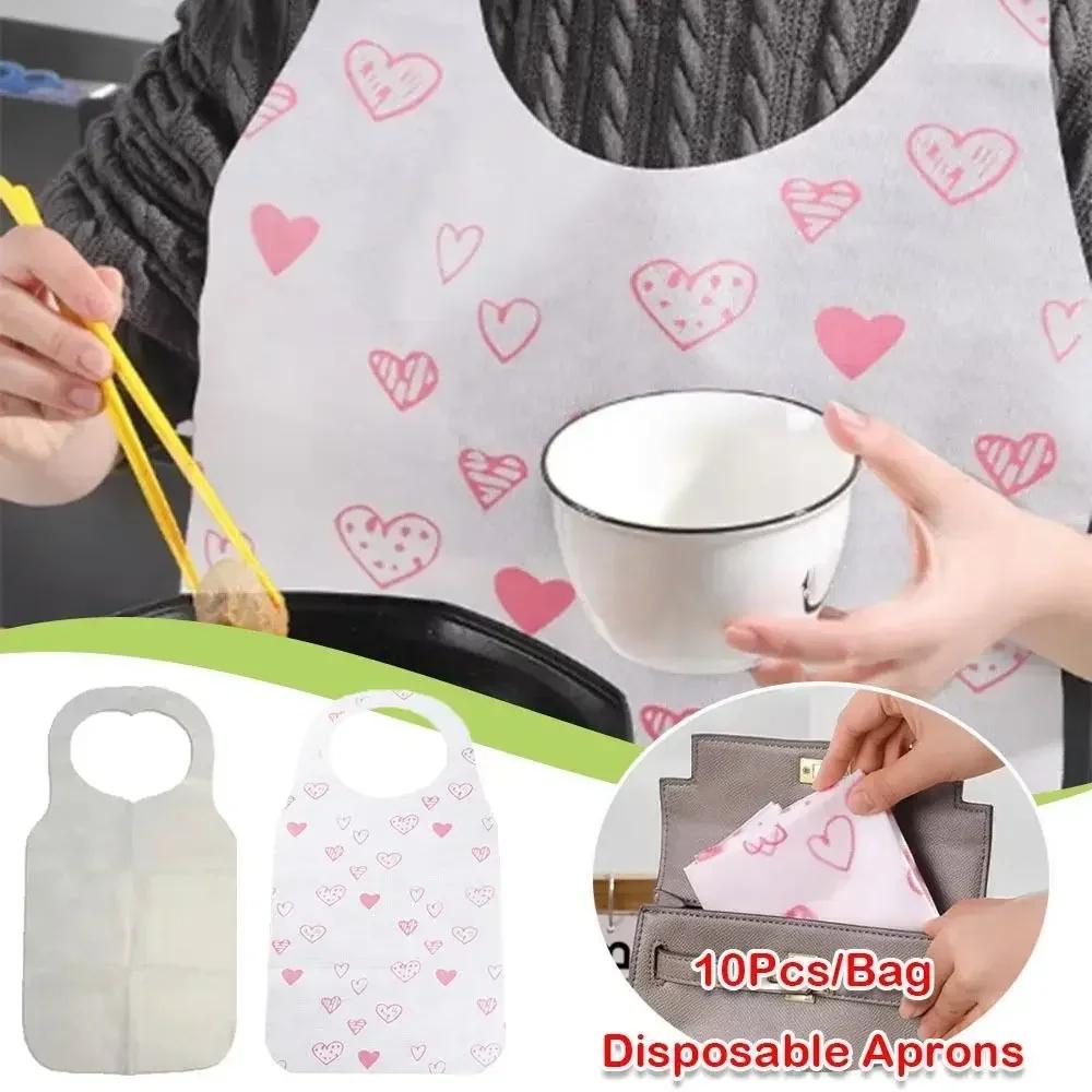 10Pcs/Bag Portable Heart Printed Disposable Aprons Oil-proof Anti-fouling Bib Non Woven Cooking Apron Restaurant Home Supplies