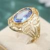Retro Oval Copper Material Inlaid With Blue Synthetic Zircon Ring Women's Fashionable Golden Court Style Ring Jewelry