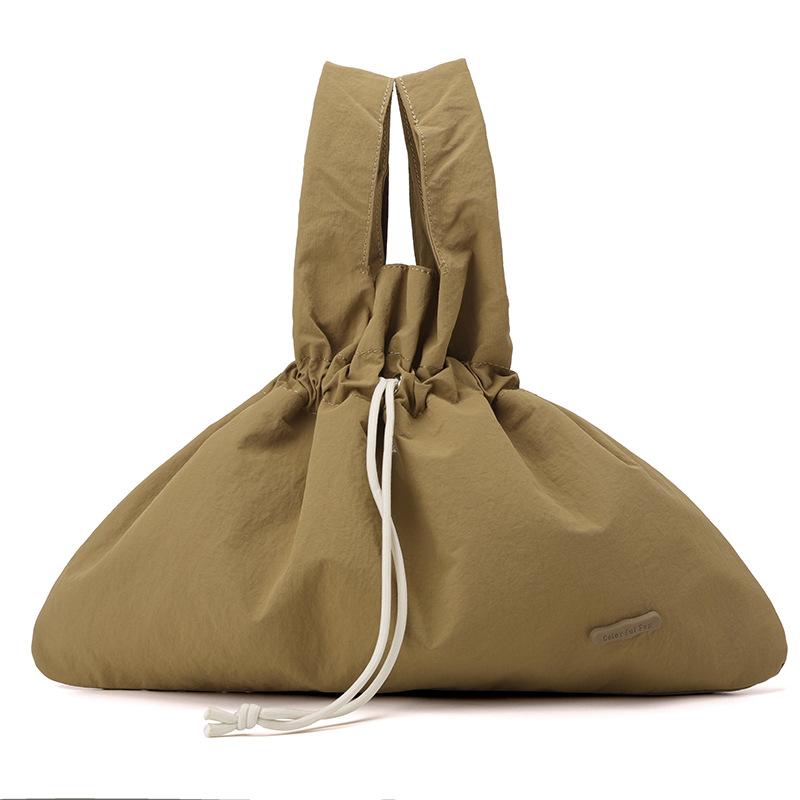 New Women's Retro Bundle Literary and Pastoral Handbag Solid Color Drawstring Commuter Bag