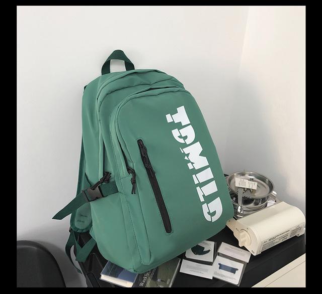 

New backpack Korean version of fashionable versatile backpack, letter printing men and women with the same style, couple campus schoolbag зелений