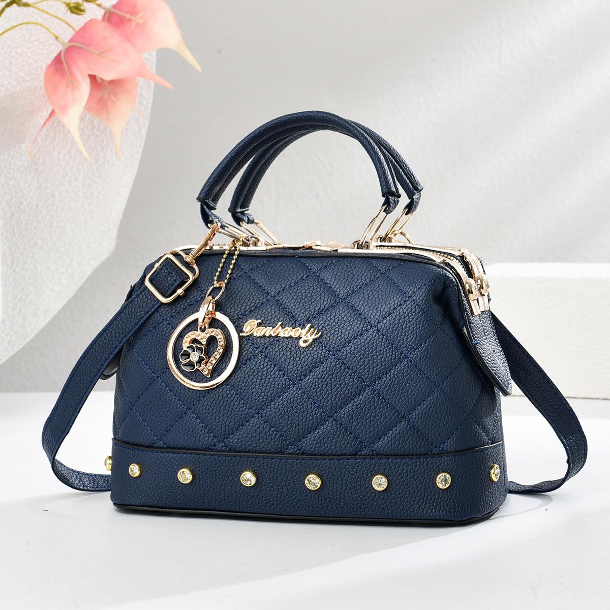 

This year, pillows are popular, hand-carried small bags, new textured large-capacity embroidered thread women s bags, foreign-style shoulder bags. синій