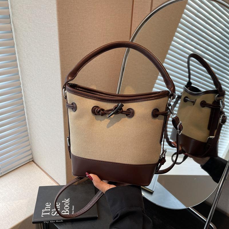 

Нишевая парусиновая сумка-ведро с лоскутным шитьем, женская новая портативная сумка для поездок на работу, модная наплечная сумка-мессенджер, тренд хаки