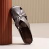 Hollow bag head slippers women's summer outer wear 2025 new versatile French flat bottom soft leather half drag high-end new models
