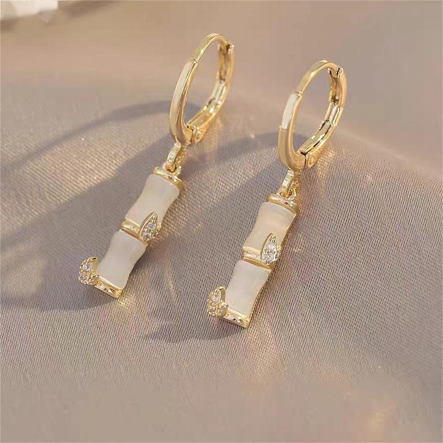 

Elegant Bamboo Joint Cat s Eye Earrings: Chic, Versatile Design for Women