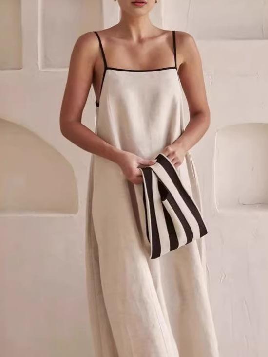 A-shaped pendulum silhouette minimalist holiday skirt, solid color loose suspender cotton and linen long dress