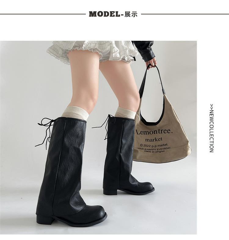 Schwarze Trageriemen-Nischendesign hohe Zigarettenstiefel Damen 2025 neue Frühling und Herbst Retro hohe Stiefel