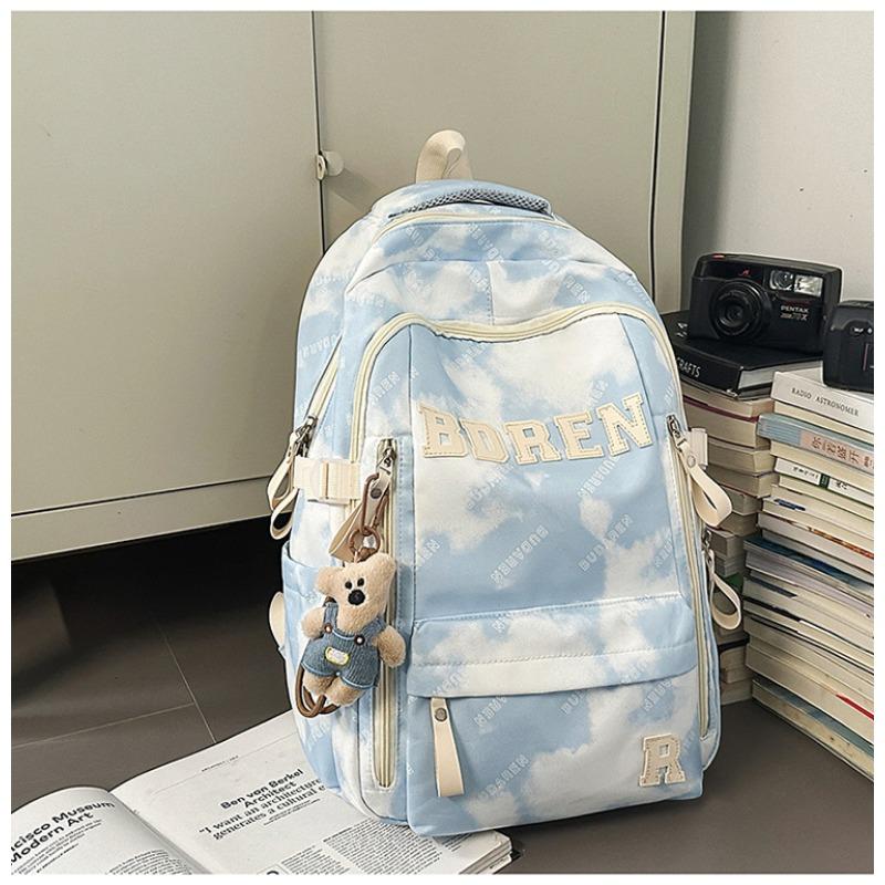 The new schoolbag is high-value, fresh and sweet, literary tie-dye backpack, couple contrasting colors, light travel backpack.