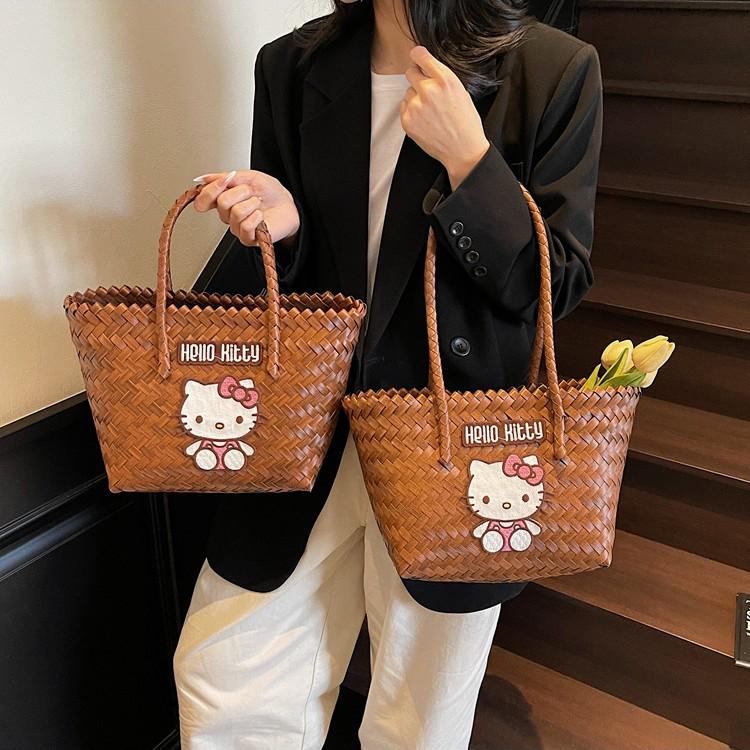 Cartoon KT Cat Rattan Beach Bag: Women's Summer Handheld Woven Basket for Seaside Holiday Commute