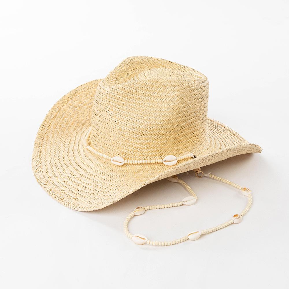 European and American fashion casual conch chain hand-woven natural grass wide-brimmed cowboy hat outdoor travel sunshade straw hat