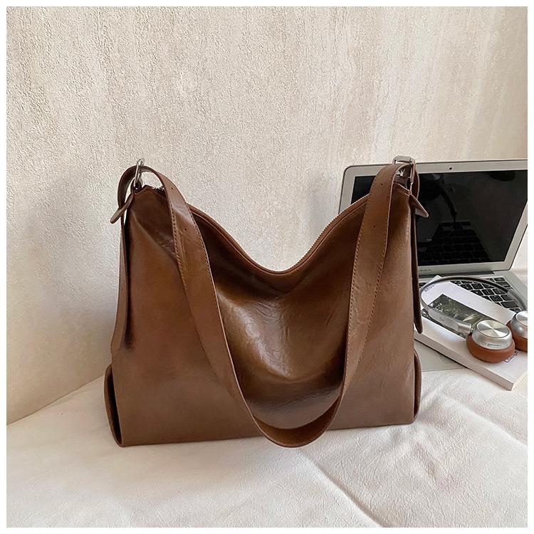 

Вместительная и высококачественная женская сумка для поездок на работу, новая, стильная, необычная, простая сумка через плечо. коричневый
